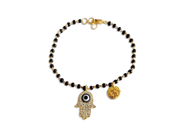 Evil Eye on Fatima’s hand with Om on mangalsutra chain in gold